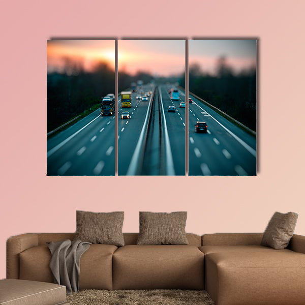 Traffic on highway, tilt shift effected photo multi panel canvas wall art