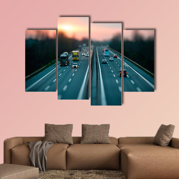 Traffic on highway, tilt shift effected photo multi panel canvas wall art