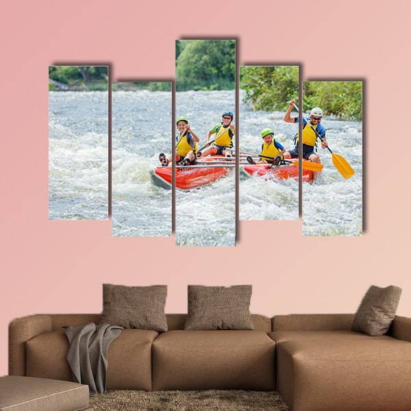 Happy family of four river rafting on the catamaran Multi panel canvas wall art