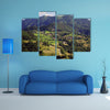 A Small village in the mountain near Podserkvom in Slovenia multi panel canvas wall art