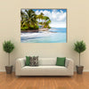 Beachfront bungalow on a tropical island Multi panel canvas wall art