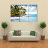 Beachfront bungalow on a tropical island Multi panel canvas wall art