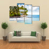 Beachfront bungalow on a tropical island Multi panel canvas wall art