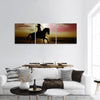 Girl riding a horse on the beach at sunset time Vertical Canvas Wall Art