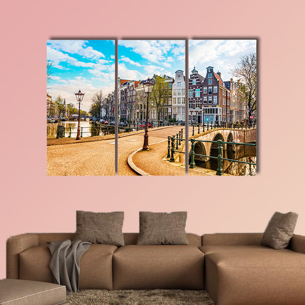 Traditional Dutch old houses and bridges on canals in Amsterdam, canvas wall art