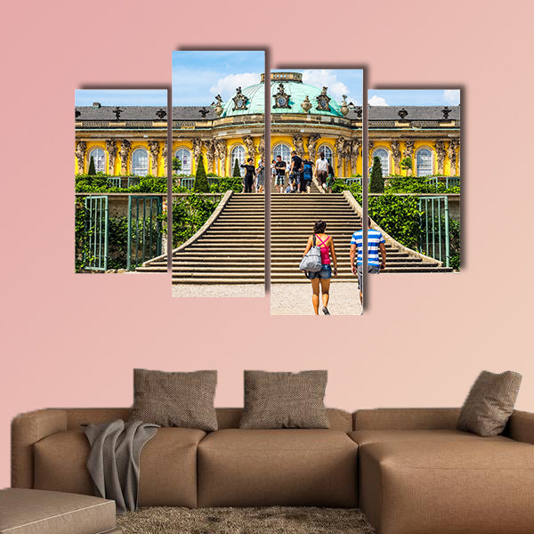 Tourists visiting the Schloss Sanssouci royal summer palace multi panel canvas wall art