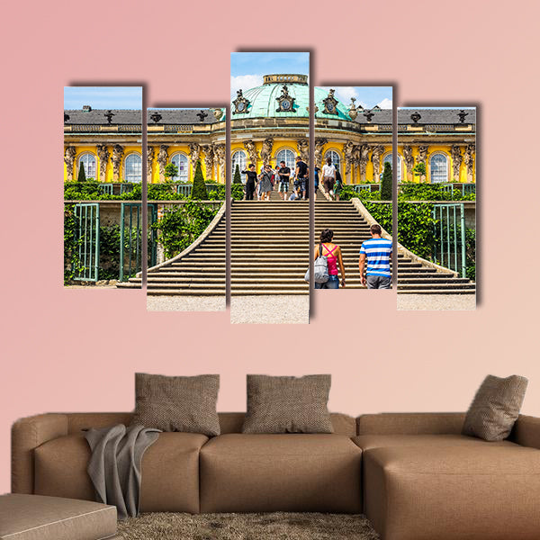 Tourists visiting the Schloss Sanssouci royal summer palace multi panel canvas wall art