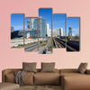 View on railroad and financial district in Vienna, Austria multi panel canvas wall art