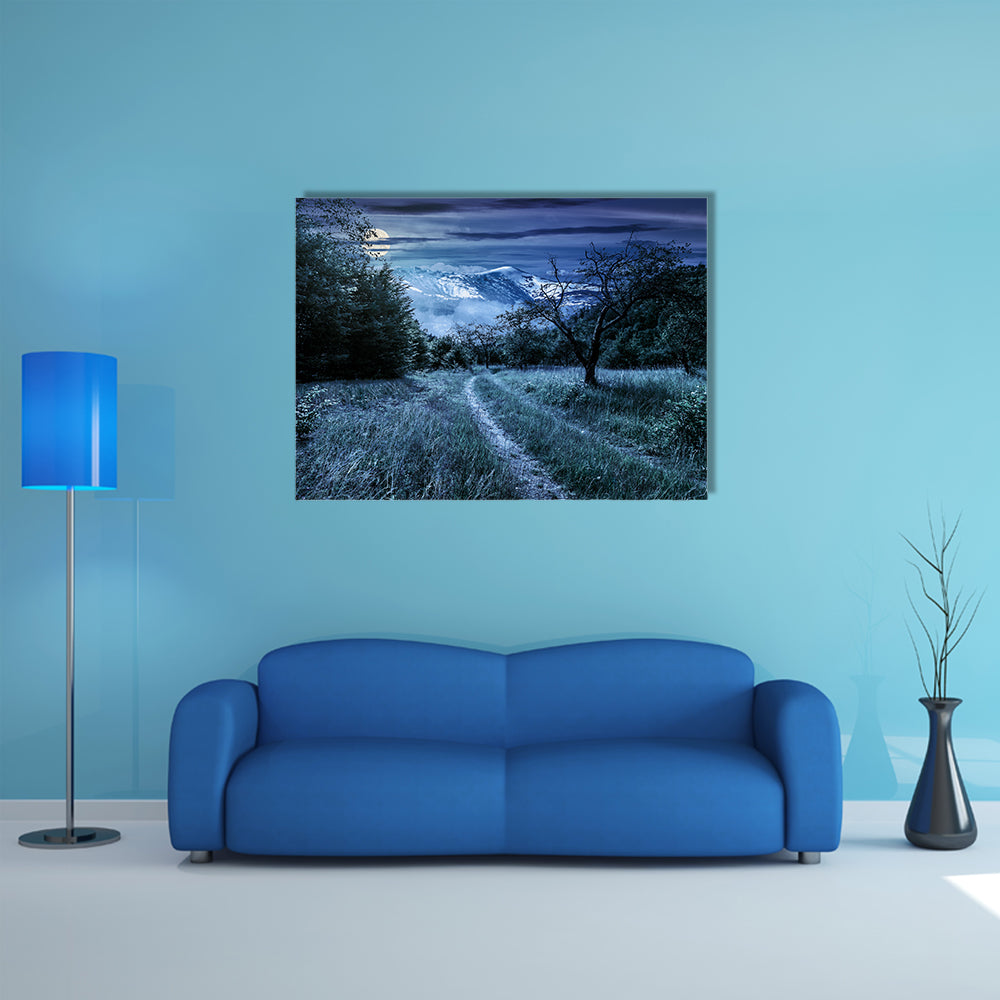 Curved Roads In A Rural Valley Crossing The Mountains With Snowy Peak In A Winter Landscape, Multi Panel Canvas Wall Art