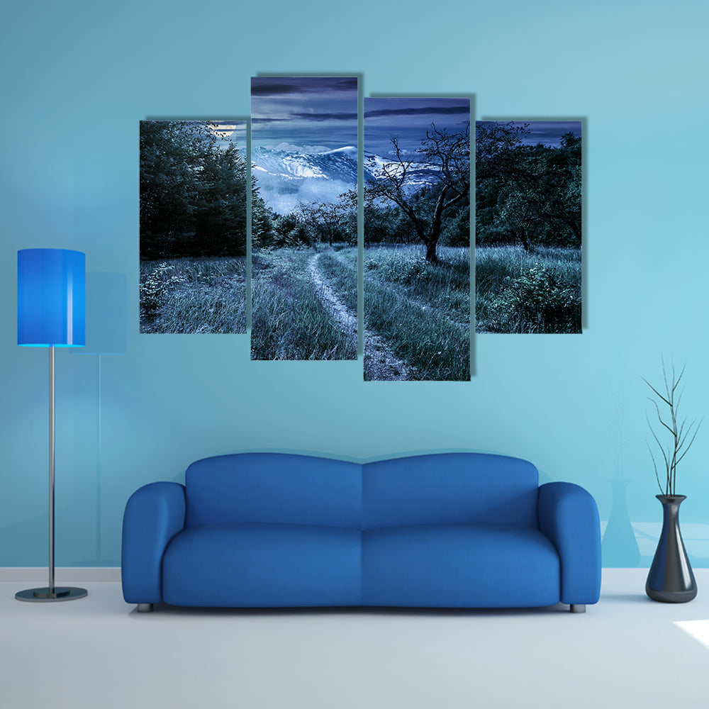 Curved Roads In A Rural Valley Crossing The Mountains With Snowy Peak In A Winter Landscape, Multi Panel Canvas Wall Art