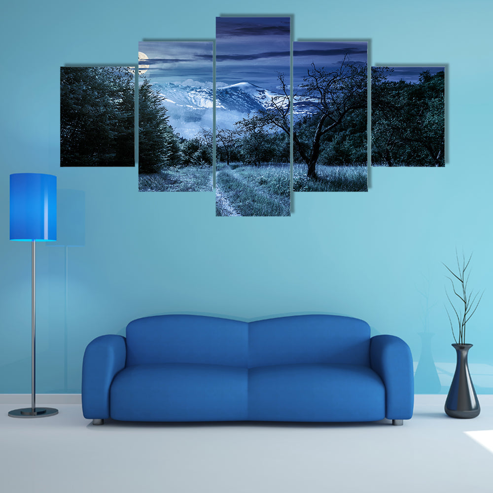Curved Roads In A Rural Valley Crossing The Mountains With Snowy Peak In A Winter Landscape, Multi Panel Canvas Wall Art