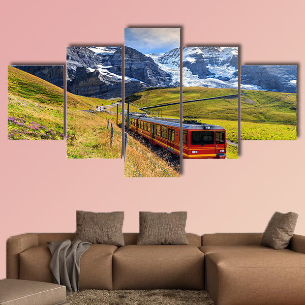 Famous electric red tourist train coming down from Jungfraujoch station art