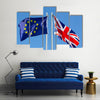 European Union flag and flag of UK on flagpole Multi panel canvas wall art