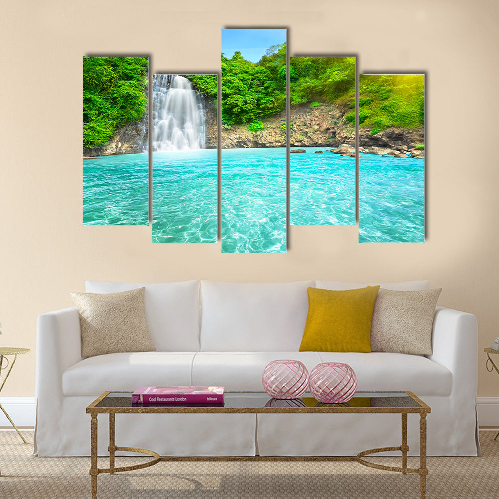 Beautiful "Dambri" waterfall in tropical forest Multi Panel Canvas Wall Art
