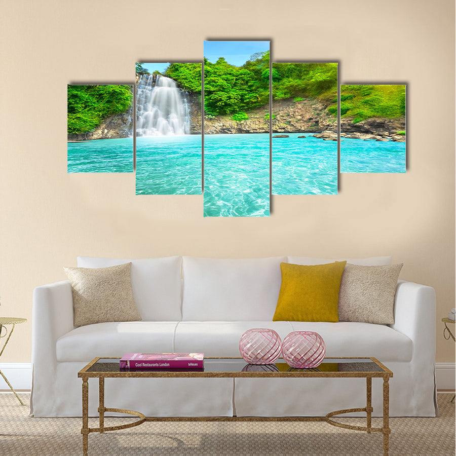 Beautiful "Dambri" waterfall in tropical forest Multi Panel Canvas Wall Art