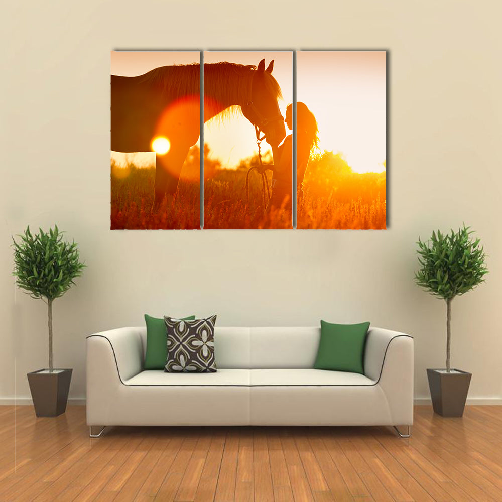 Beautiful silhouette of girl and horse at sunset multi panel canvas wall art