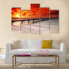 Gorgeous sunset over the sea and a jetty in the tropical paradise of Caribbean Multi Panel Canvas Wall Art