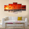 Gorgeous sunset over the sea and a jetty in the tropical paradise of Caribbean Multi Panel Canvas Wall Art