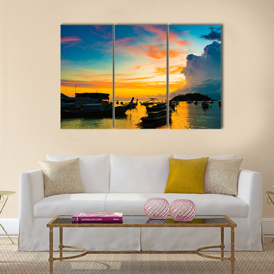 Reflection of Wooden Boat with Burning Sky during Sunrise in Andaman sea multi panel canvas wall art