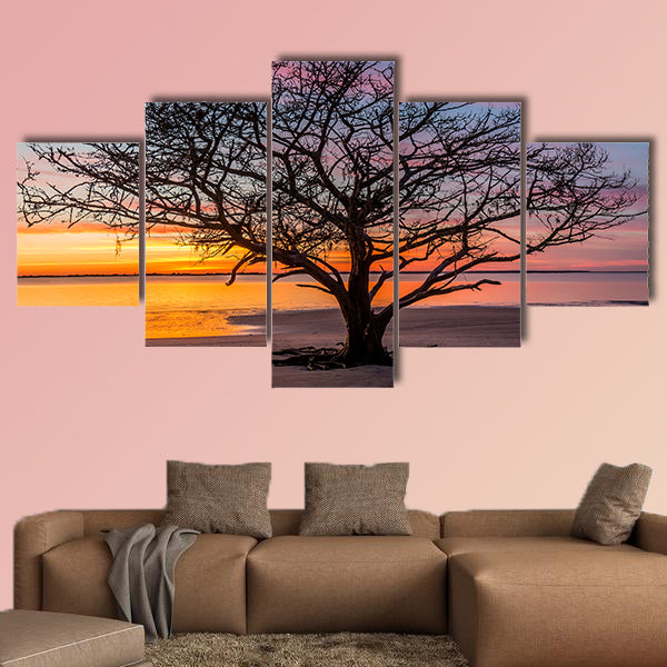 Live Oak Tree silhouetted on a barrier island beach at sunset wall art