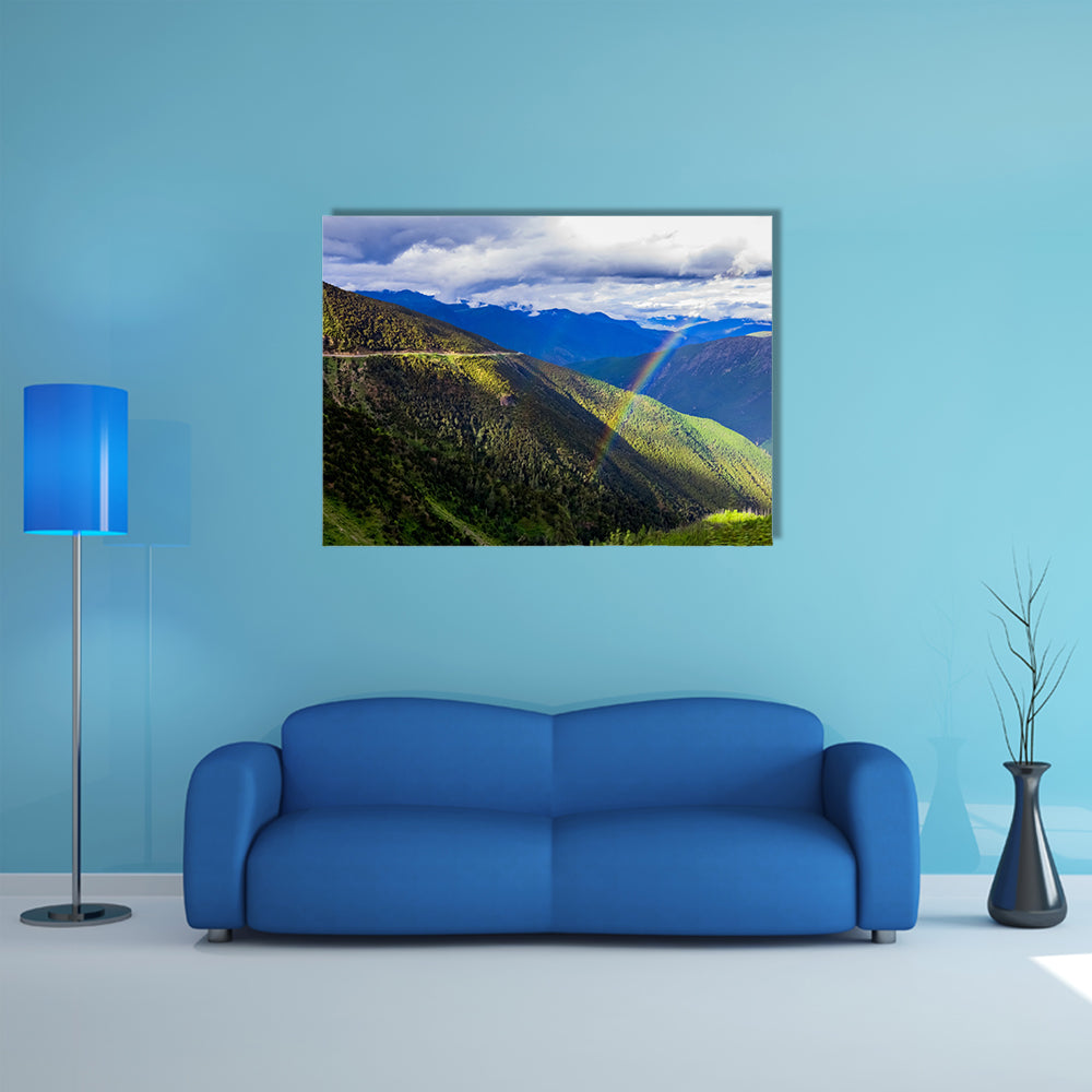 mountain landscape pine trees hillside under blue sky with clouds and rainbow multi panel canvas wall art