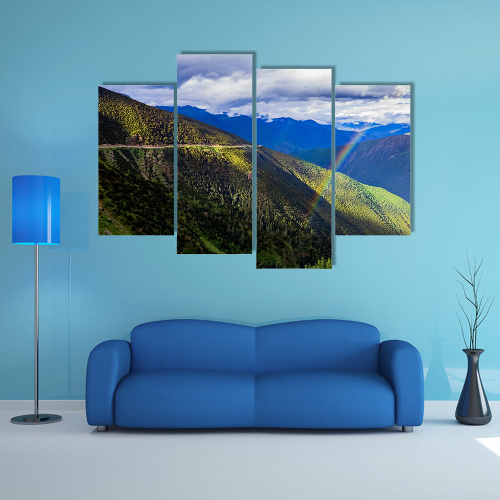 mountain landscape pine trees hillside under blue sky with clouds and rainbow multi panel canvas wall art
