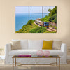 Train on the railway near Fangshan Station in pingtung Multi panel canvas wall art