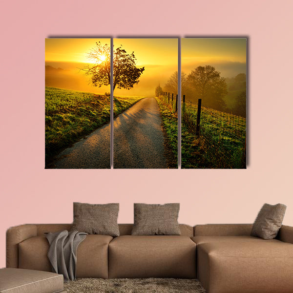 Idyllic rural landscape on a hill with a tree multi panel canvas wall art