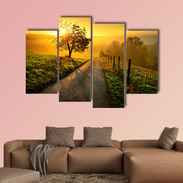 Rural landscape on a hill with a tree on a meadow at sunrise, canvas wall art