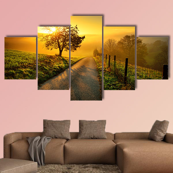Idyllic rural landscape on a hill with a tree multi panel canvas wall art