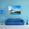 Beautiful sunrise with water villas in tropical Maldives island Multi Panel Canvas Wall Art