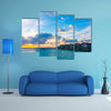 Beautiful sunrise with water villas in tropical Maldives island Multi Panel Canvas Wall Art