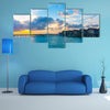 Beautiful sunrise with water villas in tropical Maldives island Multi Panel Canvas Wall Art