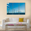 Windmills in a row further, horizontal Multi Panel Canvas Wall Art