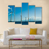 Windmills in a row further, horizontal Multi Panel Canvas Wall Art