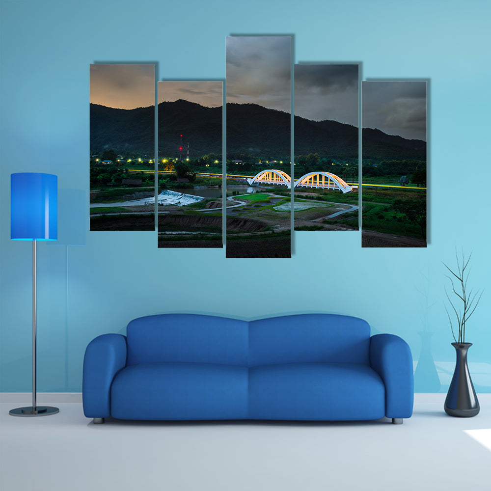 Old white railway bridge in twilight time at Lamphun, Thailand multi panel canvas wall art