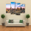 Dubai skyline with beautiful city close to its busiest highway on traffic Multi panel canvas wall art