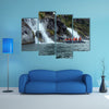 Tourists from the cruise ship near the waterfalls of the glacier Nena multi panel canvas wall art