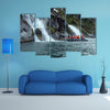 Tourists from the cruise ship near the waterfalls of the glacier Nena multi panel canvas wall art