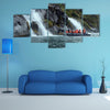 Tourists from the cruise ship near the waterfalls of the glacier Nena multi panel canvas wall art