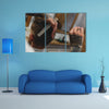 Barber Holding and Cutting hair of a Client, Hair Care Concept Multi Panel Canvas Wall Art