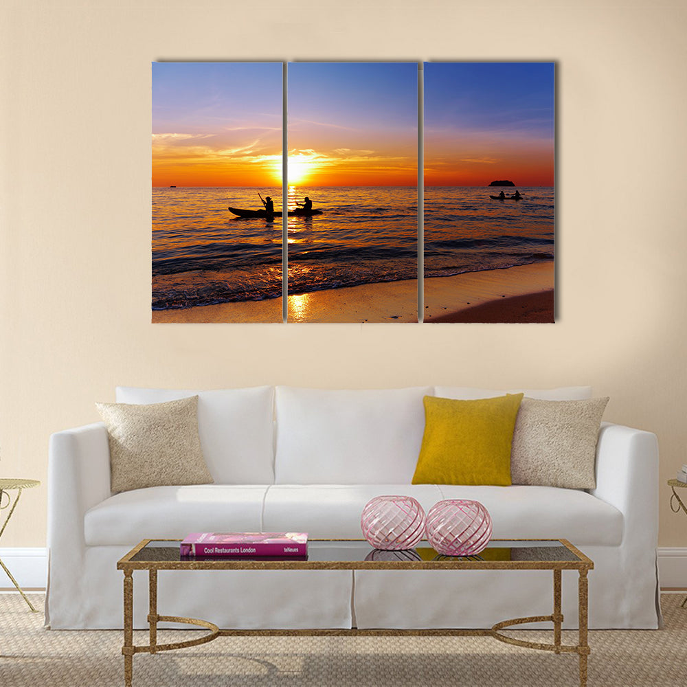 Seascape with kayakers at sunset Multi panel canvas wall art