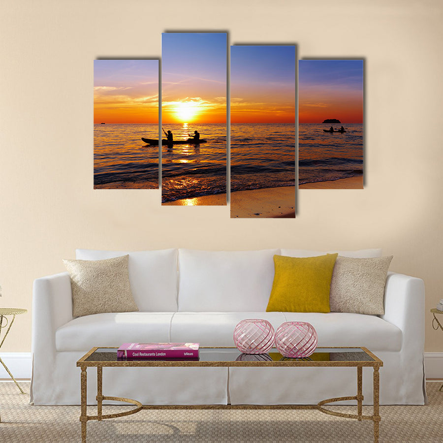 Seascape with kayakers at sunset Multi panel canvas wall art
