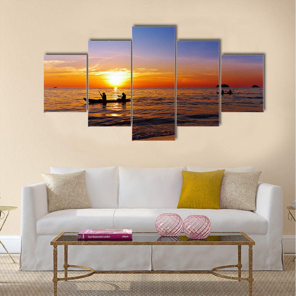 Seascape with kayakers at sunset Multi panel canvas wall art