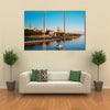 The Promenade Of Daugava In Riga, With Two Old Churches And Medieval Cost, Latvia Multi Panel Canvas Wall Art