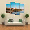 The Promenade Of Daugava In Riga, With Two Old Churches And Medieval Cost, Latvia Multi Panel Canvas Wall Art