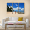 Young woman in bikini standing on the beach of Makaha'a island in Tonga Multi panel canvas wall art