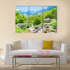 Bridge and stream in Valbona valley with Albanian Alps background Multi Panel Canvas Wall Art