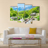 Bridge and stream in Valbona valley with Albanian Alps background Multi Panel Canvas Wall Art