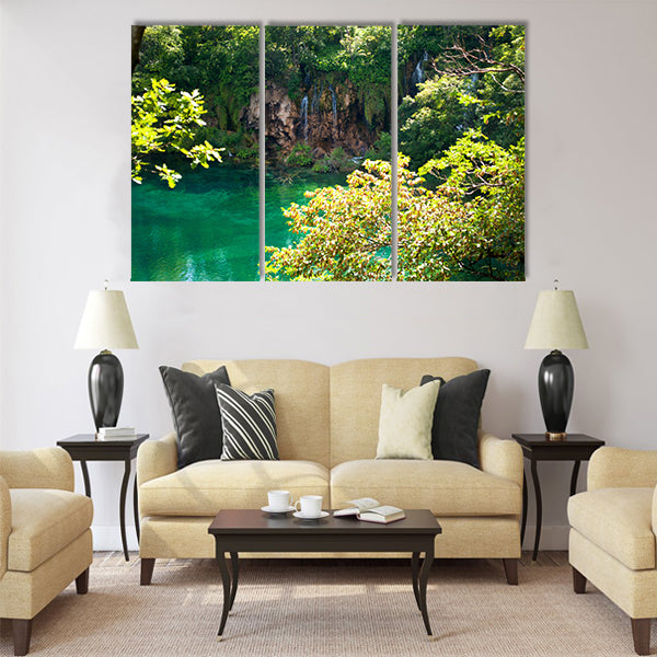 Lake with transparent emerald water multi panel canvas wall art